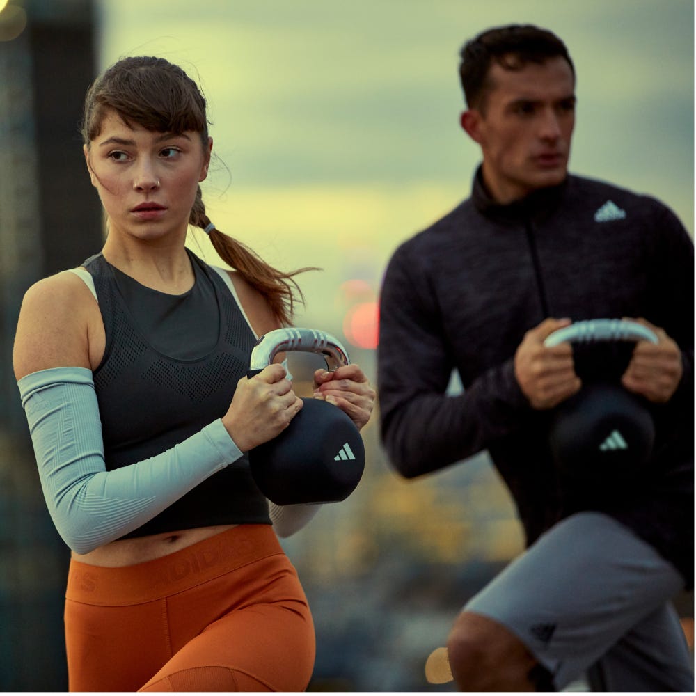 Adidas 12kg / 26lb Kettlebell being used during exercise
